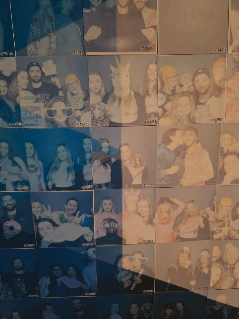 A collage of various photo booth pictures featuring groups posing playfully, some with fun costumes, hats, a unicorn mask, and sunglasses. The blue-tinted images evoke a lively corporate event experiential vibe—perfect alongside graffiti wall hire.